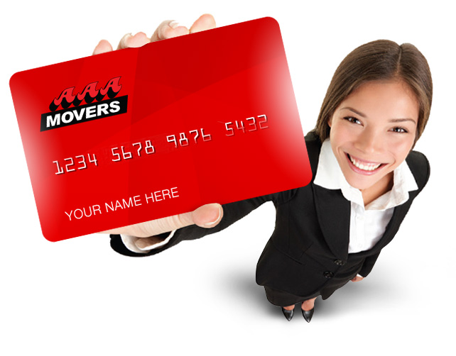 Woman holding a AAA Movers card up to to the lens