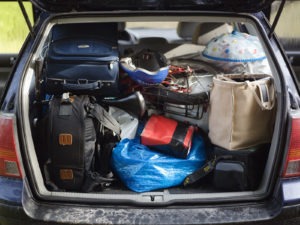 A packed trunk on a car.