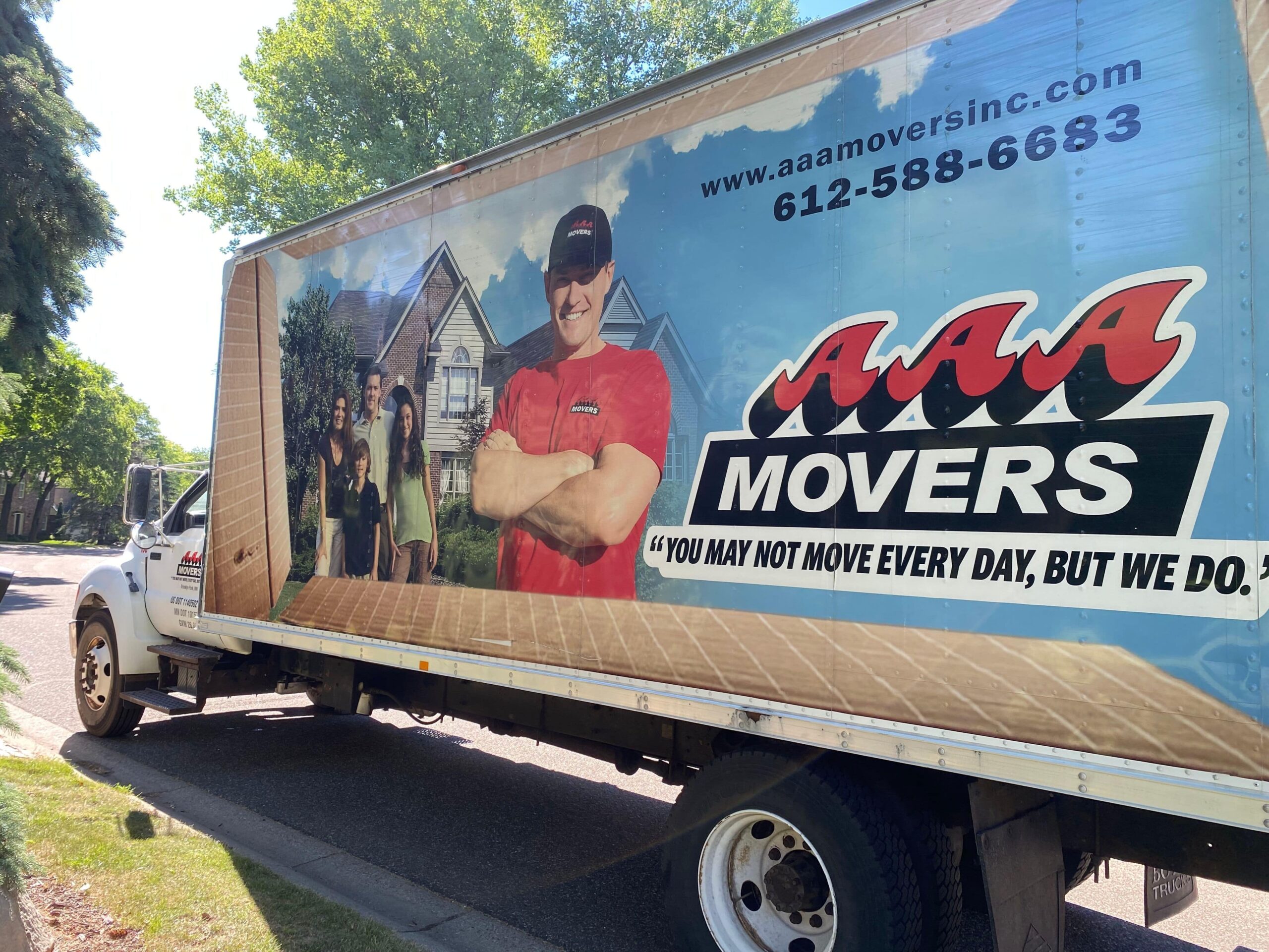 Side view of the AAA Movers truck