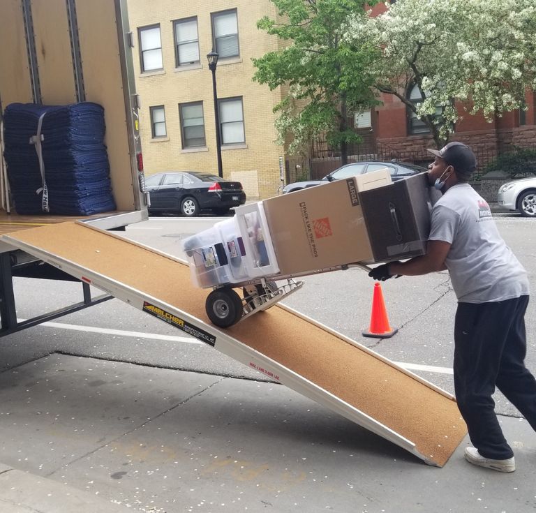 Chicago Mover Loading Dolly on Truck